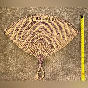 Togo Africa handmade woven fan. Has some fading